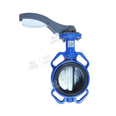 Center line clamped soft seal butterfly valve